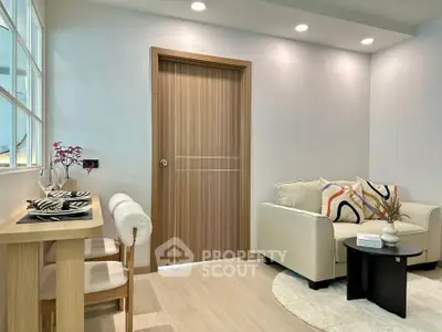 Modern living room with cozy sofa and stylish decor
