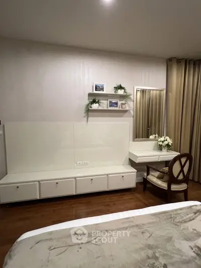 Elegant bedroom with stylish vanity and cozy decor
