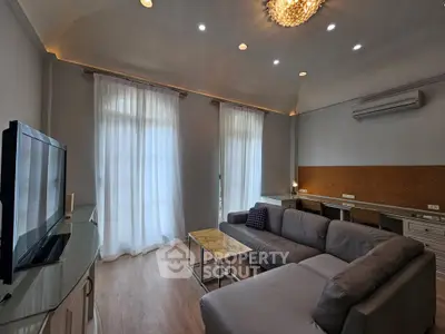 Elegant living room with modern decor and natural light