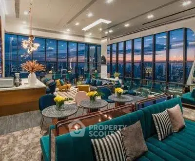 Luxurious high-rise living room with panoramic city views and elegant decor