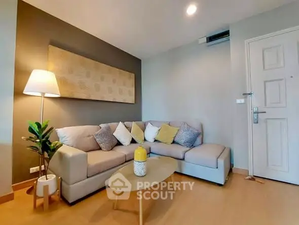 Modern living room with cozy sectional sofa and stylish decor