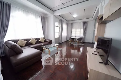Spacious living room with modern furniture and natural light