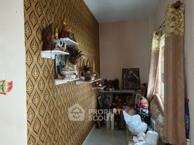 Cozy living room with decorative wall and natural light
