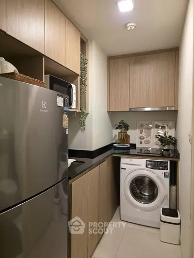 Modern kitchen with sleek appliances and efficient storage solutions