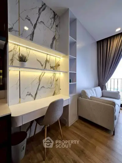 Modern living room with stylish marble accent wall and cozy seating area.