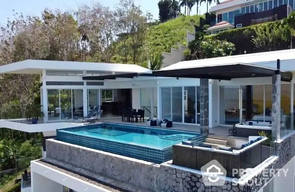 Luxurious modern villa with infinity pool and stunning hillside views