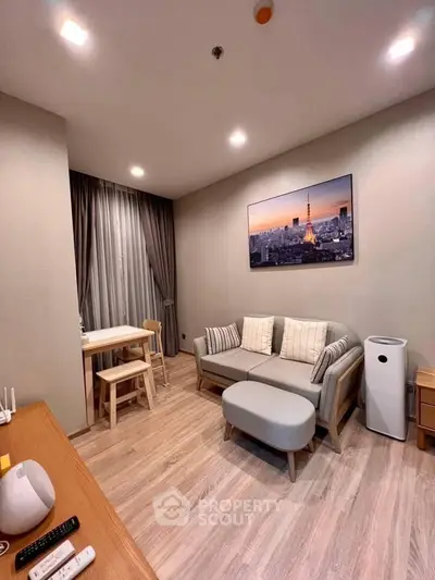 Modern living room with stylish furniture and cityscape artwork, perfect for urban living.
