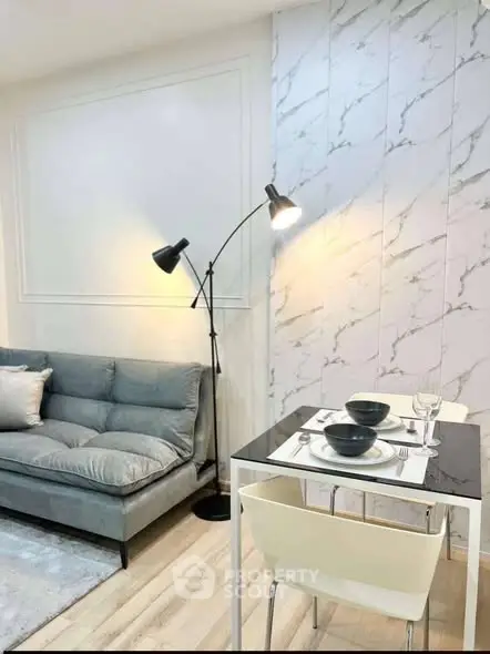 Modern living room with stylish decor and cozy dining area