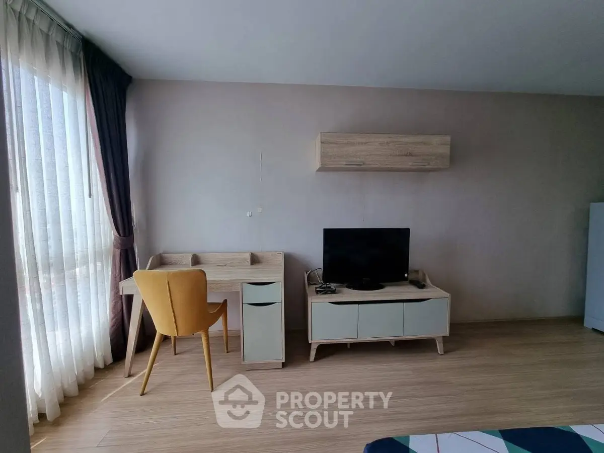 Modern living room with stylish furniture and natural light