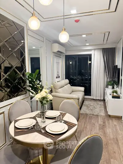 Elegant modern living room with dining area, stylish decor, and city view.