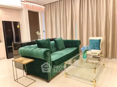 Luxurious living room with elegant green sofa and modern decor