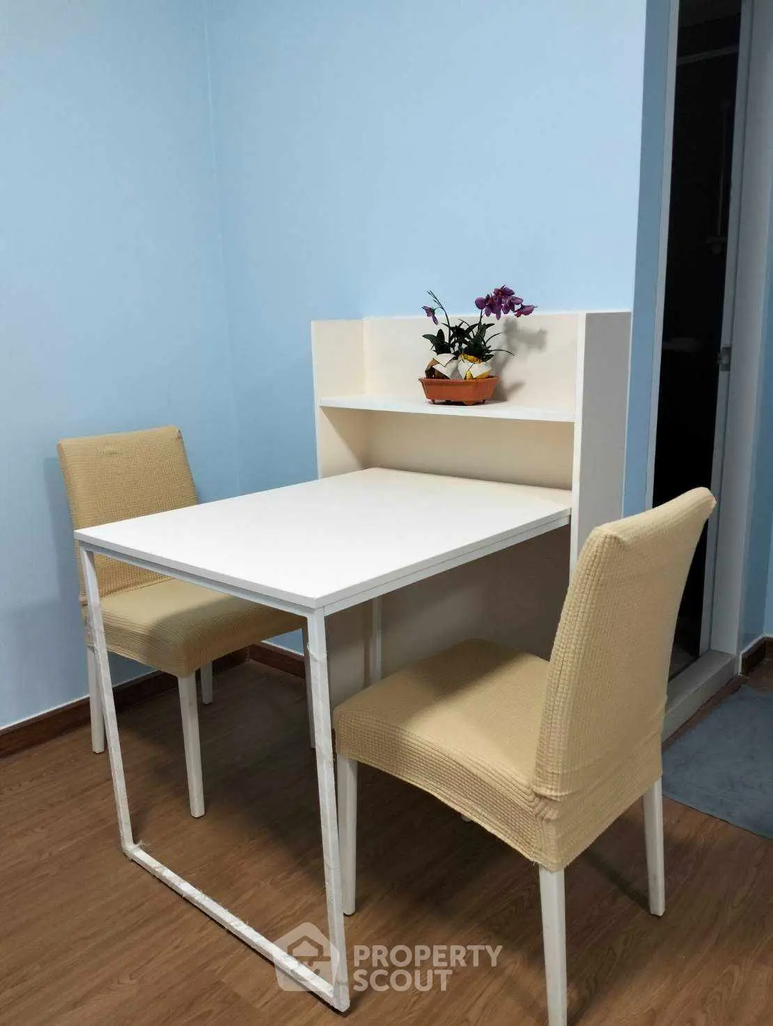 Cozy dining nook with modern table and chairs in a stylish apartment