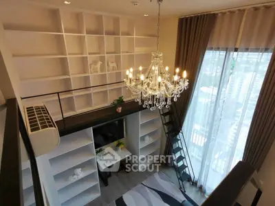 Luxurious loft living room with chandelier and floor-to-ceiling windows