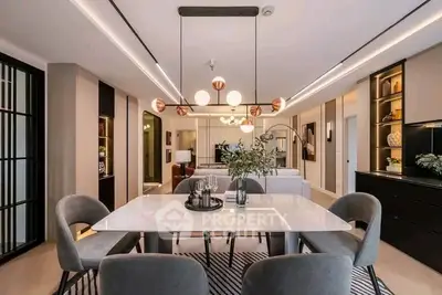 Luxurious modern dining room with elegant lighting and stylish decor