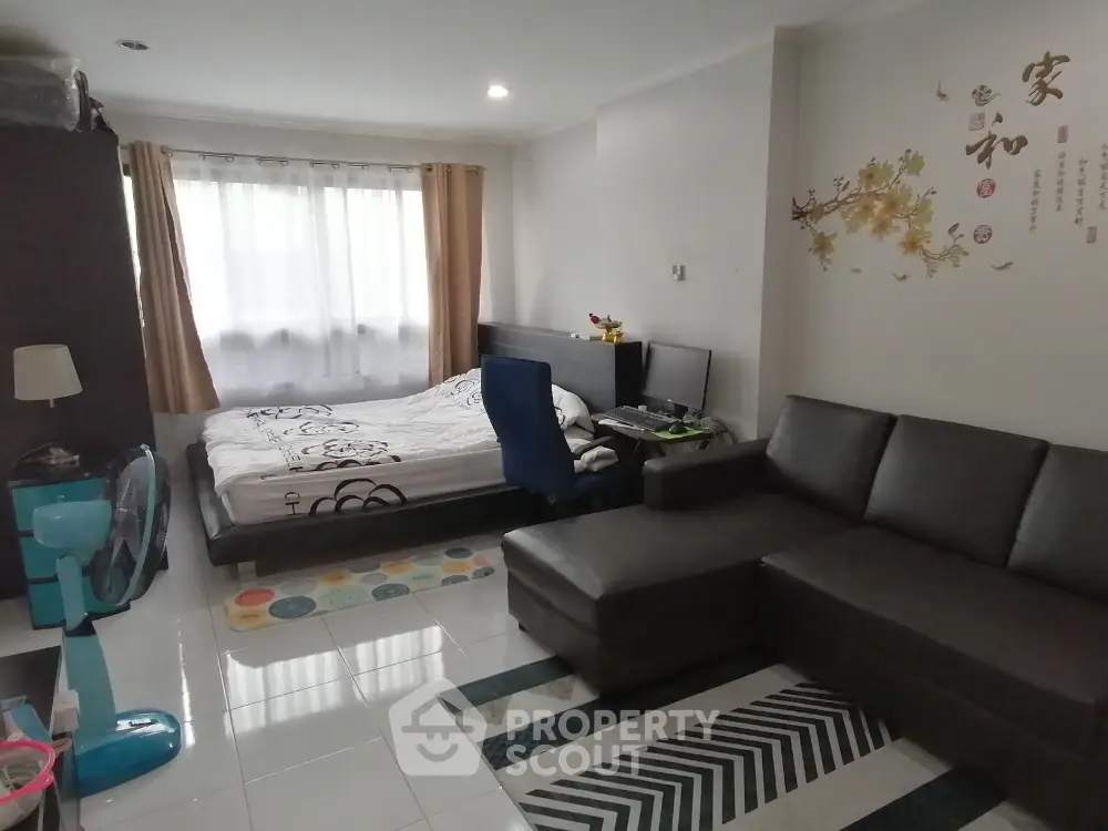 Cozy studio apartment with modern decor and natural light