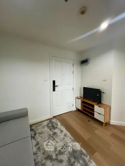 Cozy living room with modern decor and stylish furniture, perfect for relaxation and entertainment.