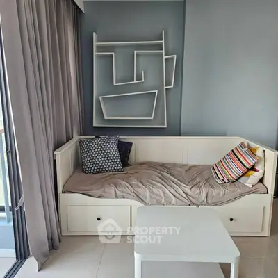 Cozy modern living room with stylish wall art and comfortable seating