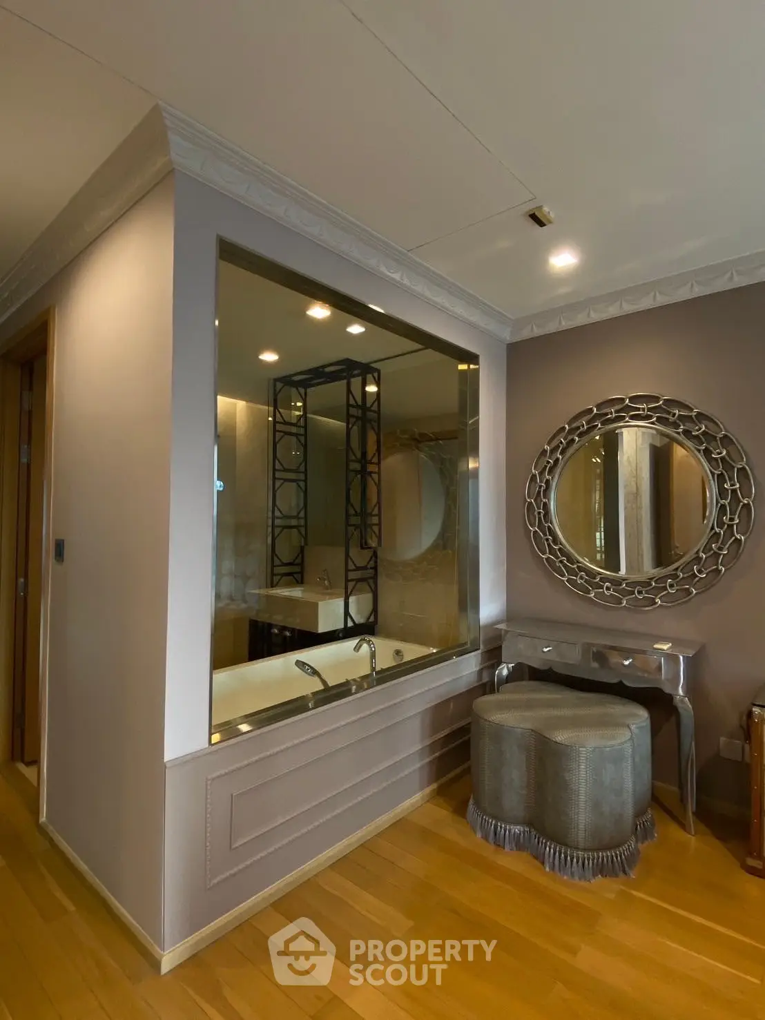Luxurious bathroom with elegant decor and large mirror