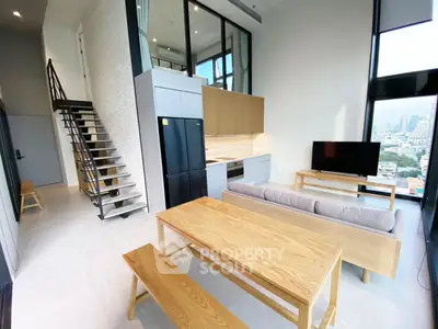 Modern loft apartment with open kitchen and stunning city view