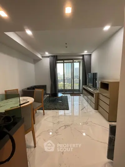 Modern living room with marble flooring, stylish furniture, and a balcony view in a high-rise apartment.