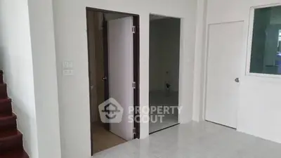 Spacious interior with modern design and multiple doorways