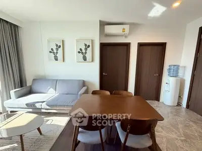 Modern living room with stylish furniture and natural light