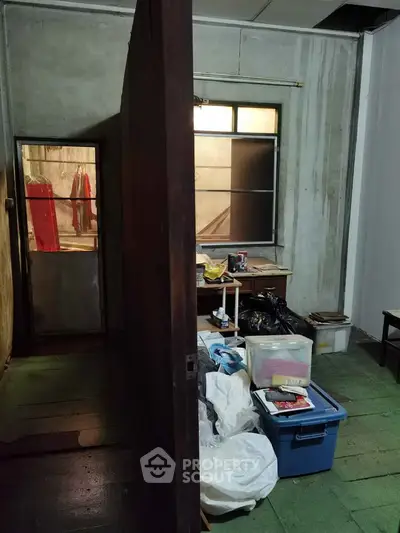 Unique storage room with vintage charm and ample space for organization.