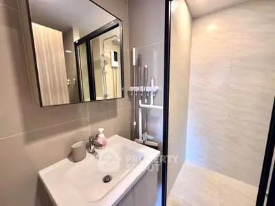 Modern bathroom with sleek design and spacious shower area
