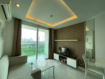 Modern living room with city view, featuring sleek furniture and ambient lighting.