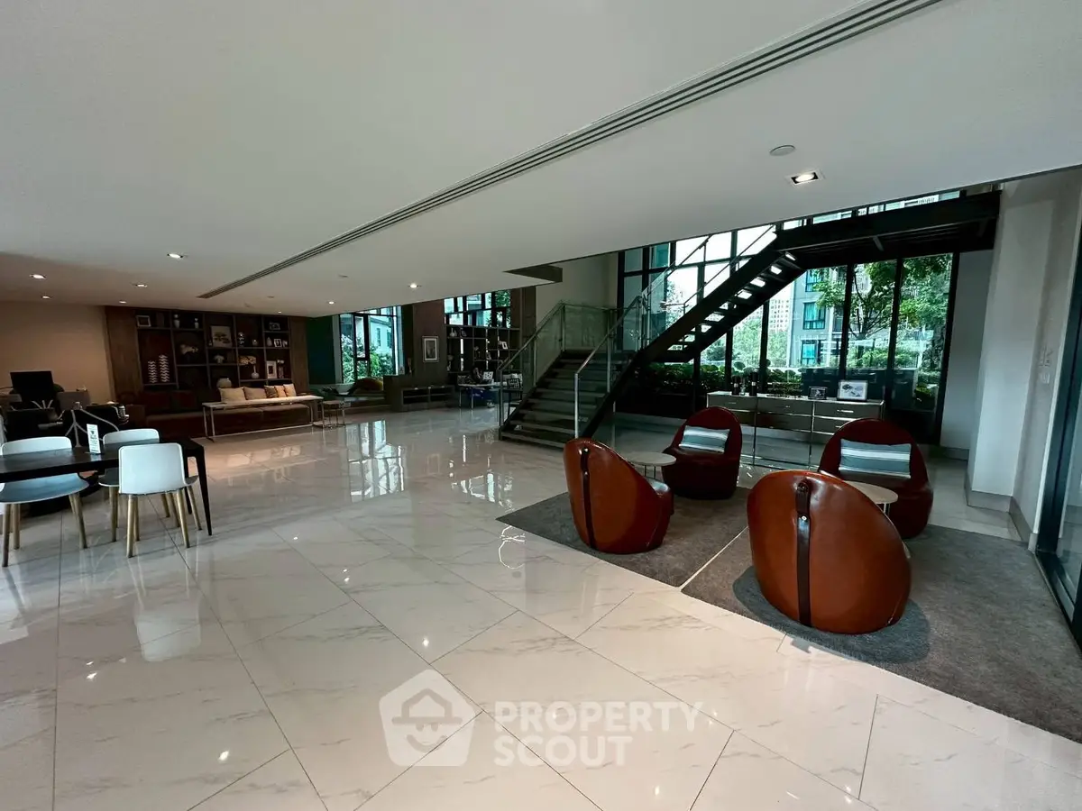 Luxurious modern lobby with sleek design and elegant seating area