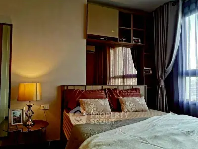 Cozy bedroom with elegant decor and ample natural light