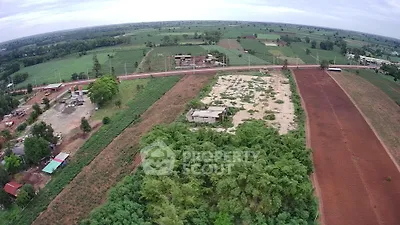 Expansive aerial view of lush agricultural land with potential for development