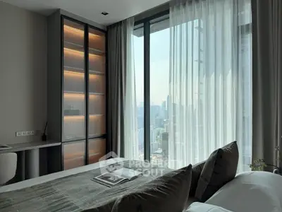 Luxurious bedroom with city view and elegant decor