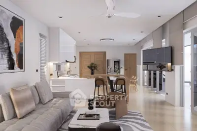 Modern open-plan living room with stylish decor and neutral tones, featuring a cozy seating area and sleek kitchen.