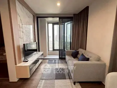 Modern living room with stylish decor and city view balcony