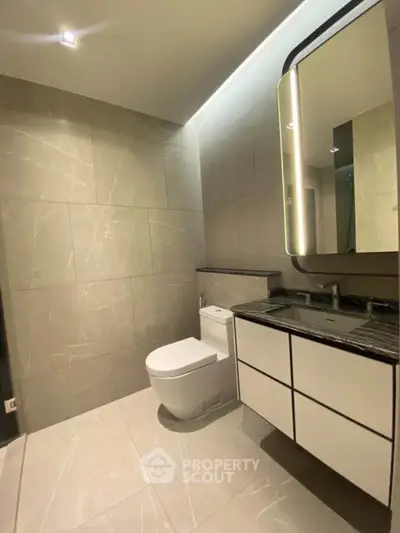 Modern bathroom with sleek design and elegant fixtures in a luxury property.