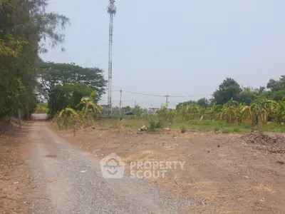 Expansive land plot with potential for development, featuring open space and natural surroundings.