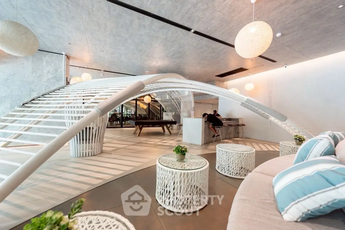 Modern living room with unique architectural design and stylish furniture