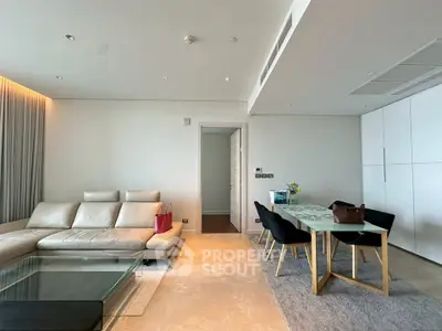 Modern living room with elegant dining area and stylish furniture