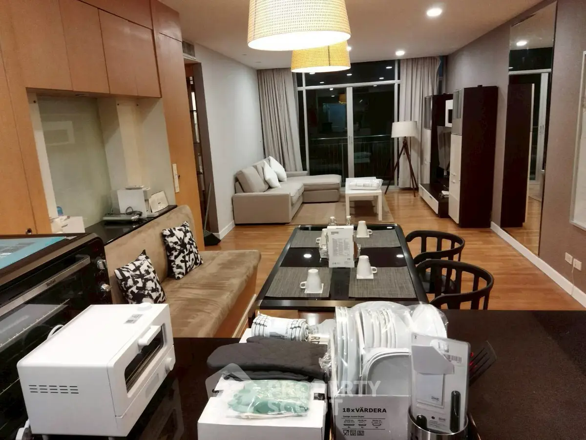 Spacious modern living room with open kitchen and elegant decor