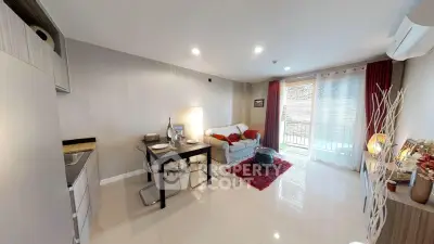 Modern living room with dining area and balcony access in stylish apartment.