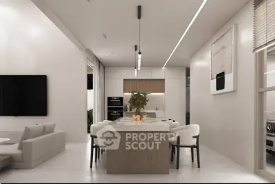 Modern open-plan kitchen and dining area with sleek design and neutral tones.