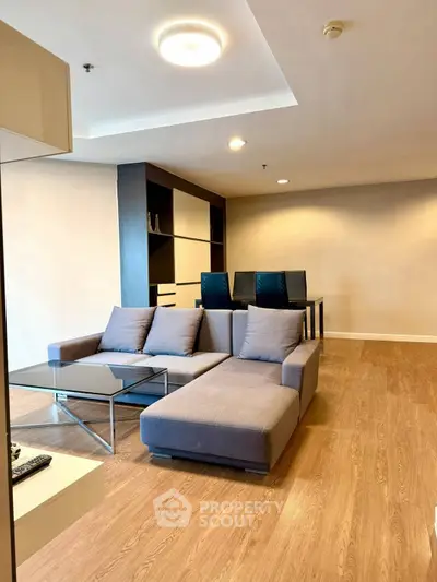 Spacious modern living room with stylish furniture and open layout