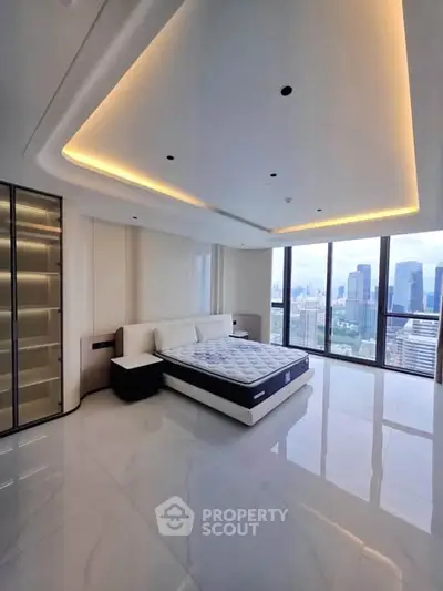 Luxurious bedroom with stunning city view and modern design in high-rise apartment