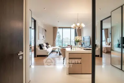 Luxurious open-plan living room with city view, elegant decor, and modern furnishings in a high-rise apartment.