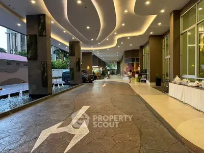 Luxurious building entrance with modern lighting and elegant design