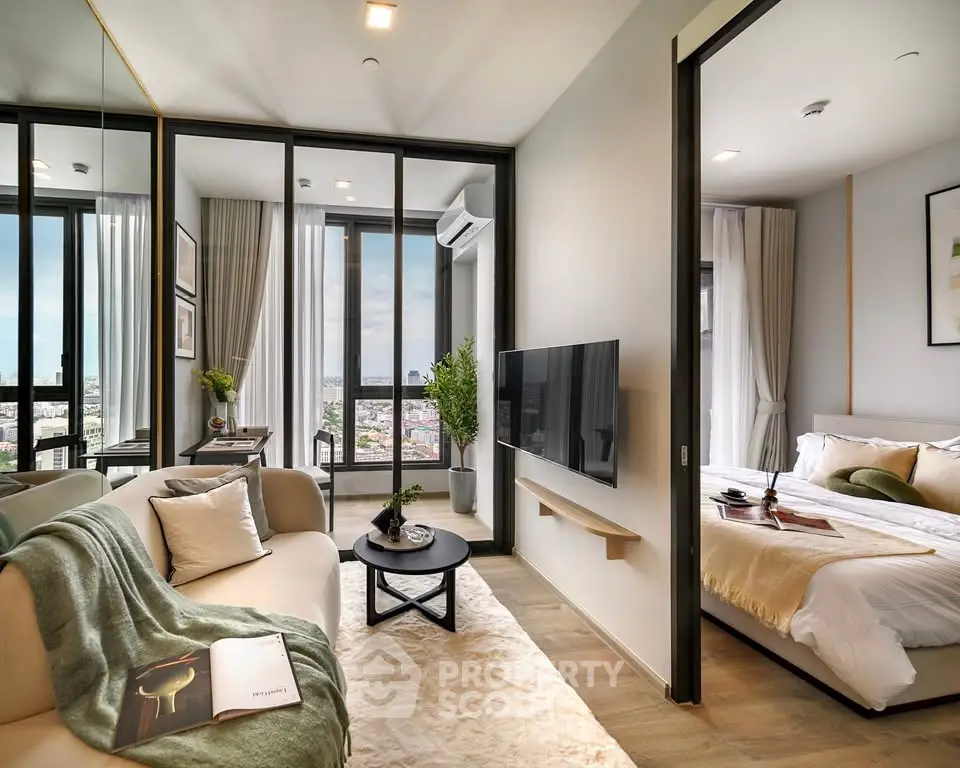 Modern apartment with open living room and bedroom, featuring stylish decor and city view.