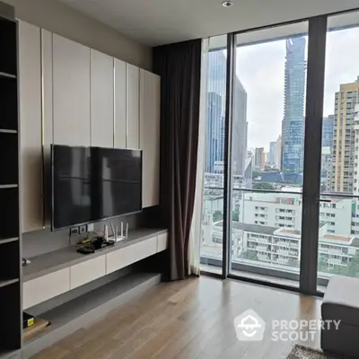 Modern living room with city view and sleek entertainment center