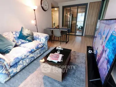 Stylish living room with elegant decor and modern furniture in a cozy apartment setting.