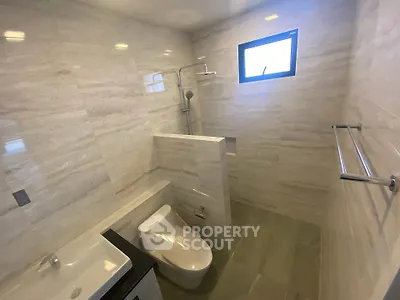 Modern bathroom with sleek fixtures and natural light